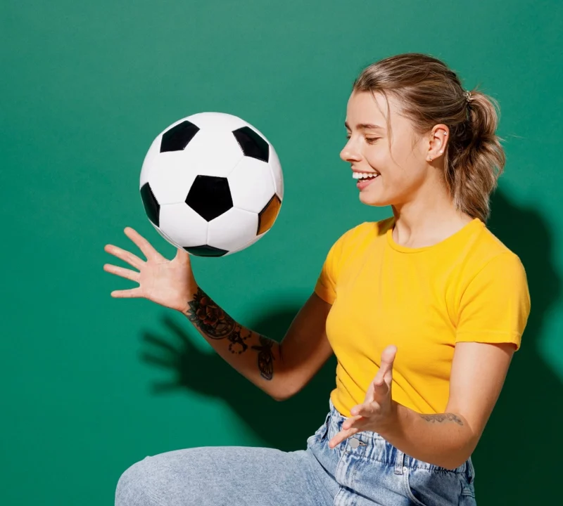 young woman playing soccer