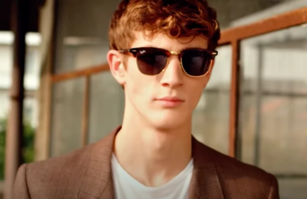 RayBan video poster man wearing rayban sunglasses