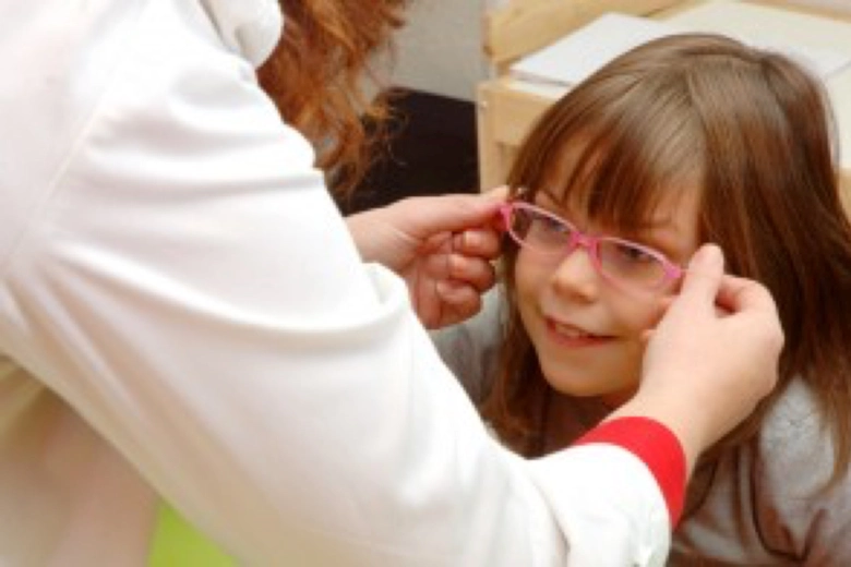 child getting new glasses
